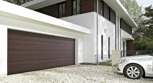 Секционные ворота для гаража: конструкция, принцип работы и особенности