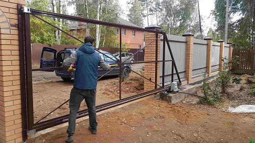 Правила и этапы установки откатных ворот Правила и этапы установки откатных ворот